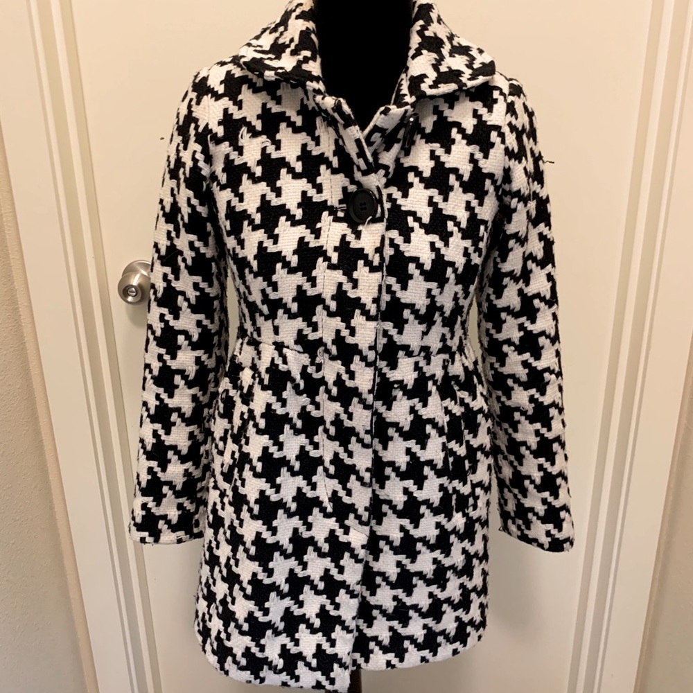 Black and white bow back pea coat.